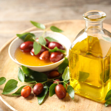 Uleiul de jojoba: proprietăți, beneficii și efecte adverse